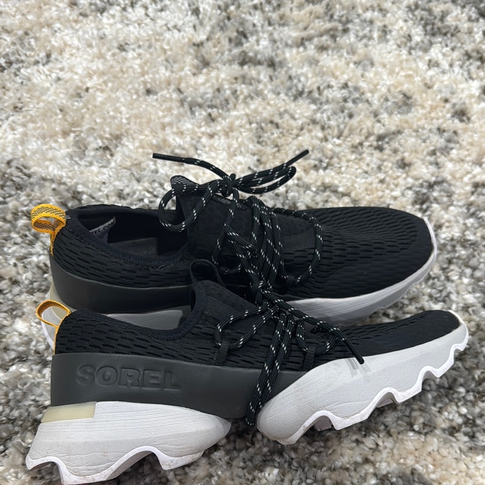 Sorel Black Sneakers with White and Yellow Accents